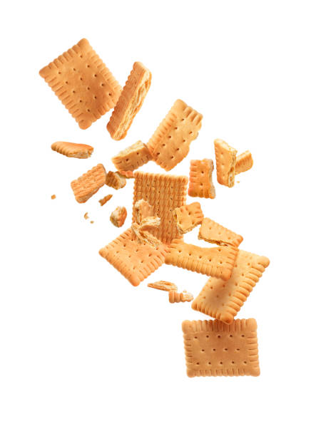 istock Cookies are broken into pieces with falling crumbs down 1283836594
