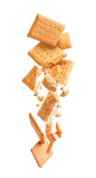 istock Cookies are broken into pieces with falling crumbs down 1283836653