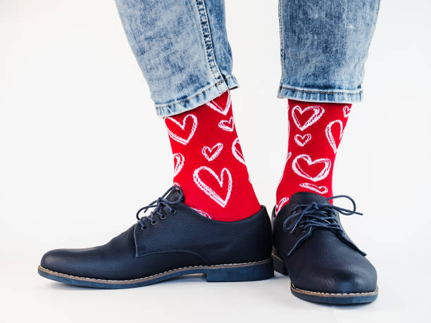 istock Men's legs, trendy shoes and bright socks 1283837773