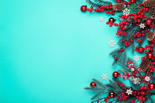 istock Decorated Christmas tree on the blue background. Top view with copy space for your text. 1283838202