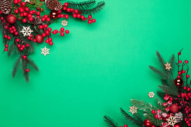 istock Christmas ornament on the green background. Top view with copy space for your text. 1283838203