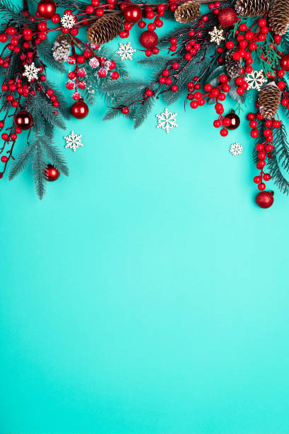 istock Christmas ornament on the blue background. Top view with copy space for your text. Vertical photo. 1283838212
