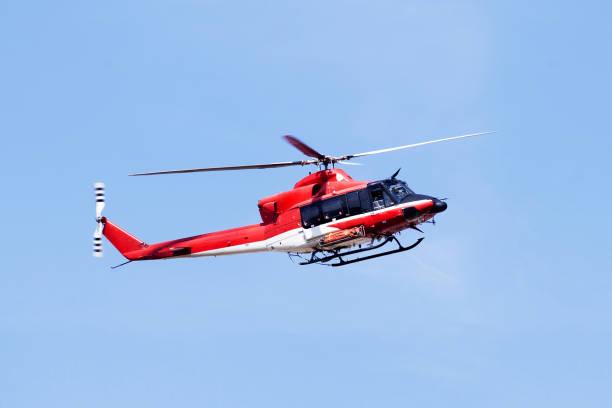 istock Rescue helicopter with blue sky in the background 1283841431