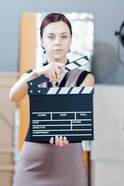 istock Caucasian Woman Posing with Action Cut in Studio Environment. Vertical image Composition 1283842693
