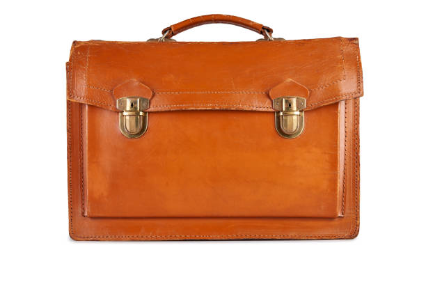 istock Aged and scratched business leather Hand Bag. 1283842939