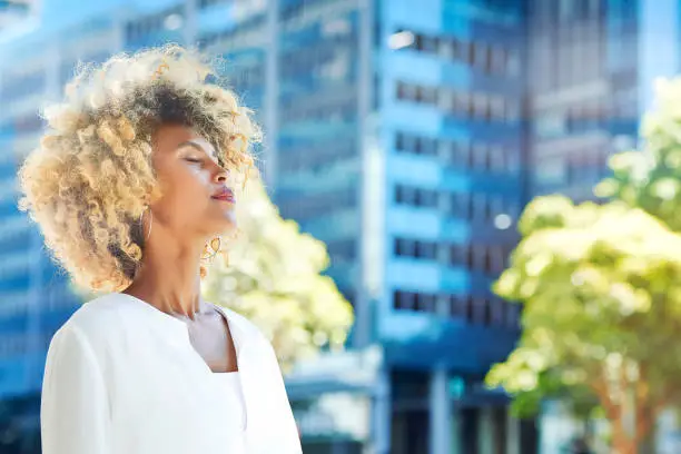 Photo of Beautiful businesswoman relaxing outdoor