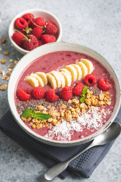 istock Vegan raspberry and acai smoothie bowl with toppings 1283847023
