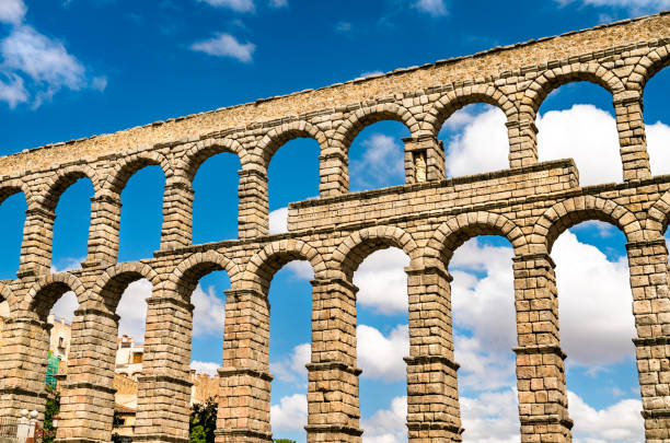 istock Ancient roman aqueduct in Segovia, Spain 1283848494
