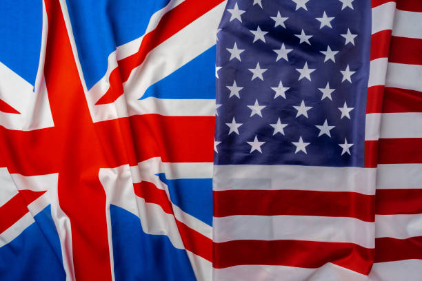 istock Flags of Great Britain and USA folded together 1283848506