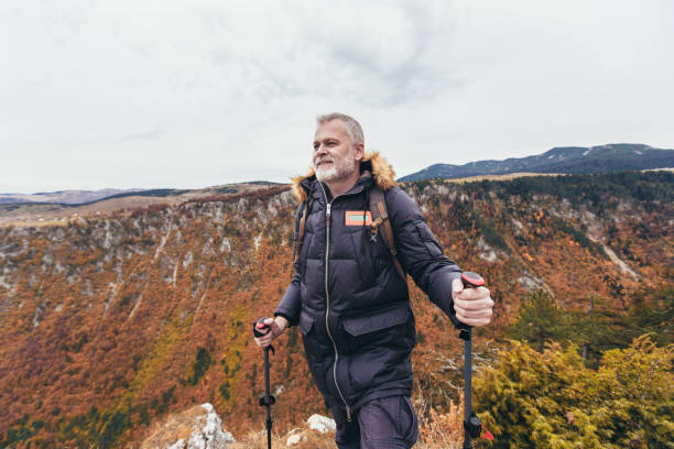 istock Happy mature man hiking in autumn 1283848822