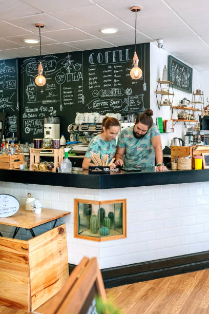 istock Owners of a coffee shop working looking at the tablet 1283849881