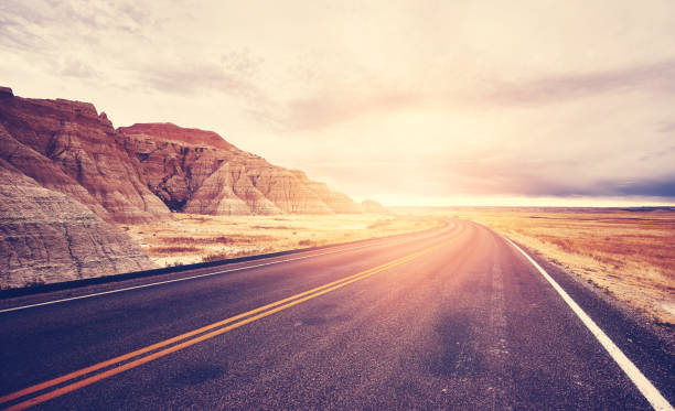 istock Scenic desert road at sunset, USA. 1283850698
