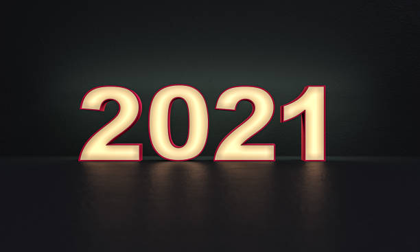 istock 2021 year - numbers - frosted glass - dark background - 3d rendering 1283850879