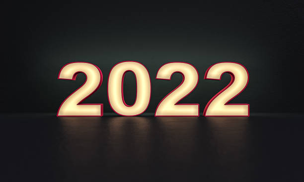 istock 2022 year - numbers - frosted glass - dark background - 3d rendering 1283850880