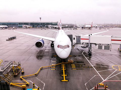 October 04, 2020 – Terminal 5, London Heathrow Airport, United Kingdom. Passenger aircraft parked up at stands around Terminal 5, at London Heathrow Airport, UK.