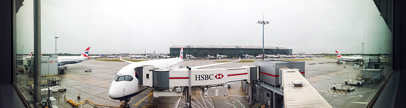 October 04, 2020 – Terminal 5, London Heathrow Airport, United Kingdom. Passenger aircraft parked up at stands around Terminal 5, at London Heathrow Airport, UK.