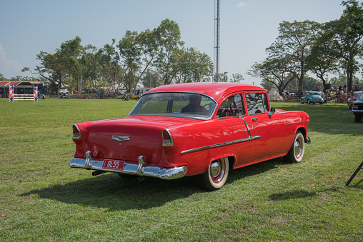 Darwin, NT, Australia-July 27,2018: Vintage car parade with red Chevy Bel-Air at the Darwin Show Day in the NT