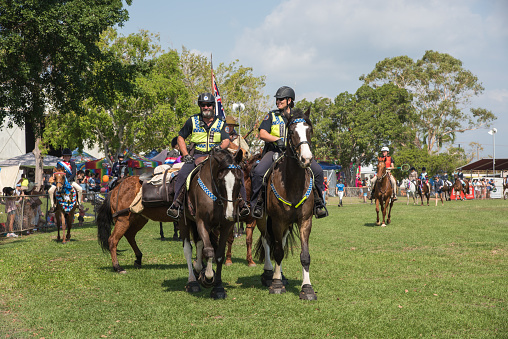 Darwin, NT, Australia-July 27,2018: Mounted police and others riding horses at the Darwin Show Day in the NT