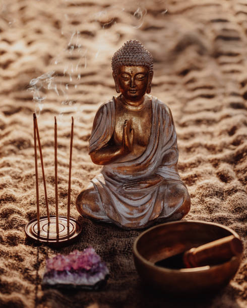 istock Buddha figurine with incense, gong and amethyst 1283852384