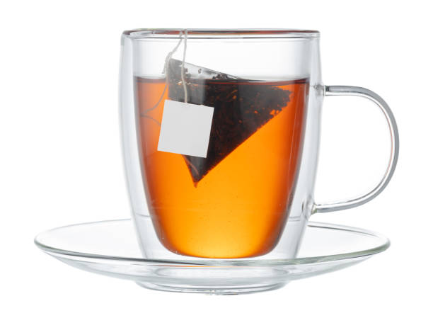 istock Glass cup of tea isolated on white background 1283854439