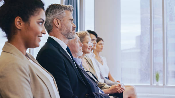 istock Satisfied entrepreneurs listening speech at seminar. Board room 1283855667
