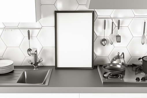 Kitchen Counter Top with Empty Picture Frame. 3d Render