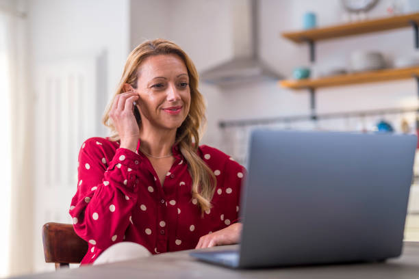 Mature woman working from home