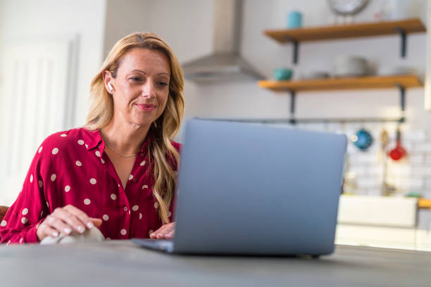 istock Mature woman working from home 1283860826