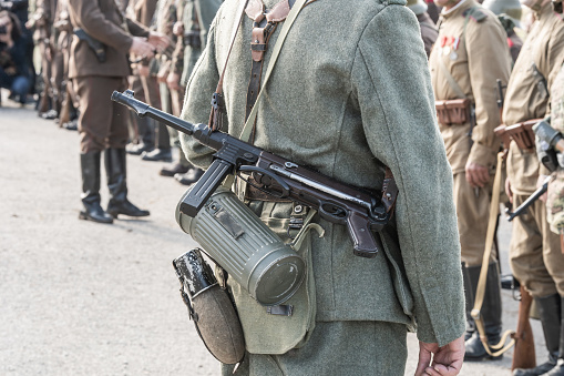 Belarus, Gomel. May 9, 2018. Victory Day. Historical reconstruction in 1945, capture of the Reichstag.A Soviet officer of the Second World War shoots a pistol. Soldier of the Red Army