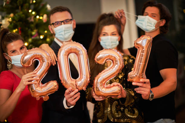 istock Two beautiful young couples having fun at New Year's Eve Party 1283862273
