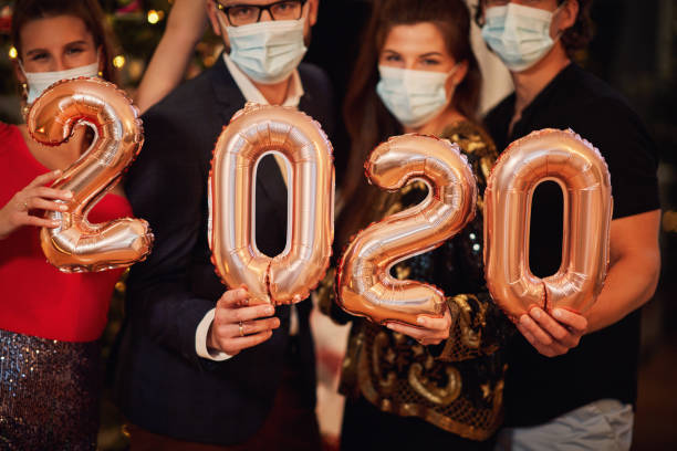 istock Two beautiful young couples having fun at New Year's Eve Party 1283862391