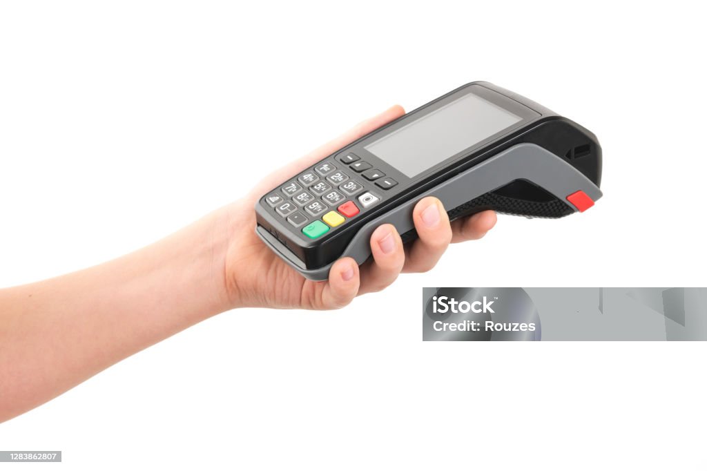 Credit card terminal in hand on white background Payment terminal in hand of man isolated on white Point Of Sale Stock Photo