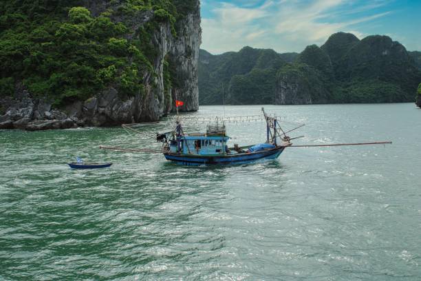 istock Fishig boat in Halong Bay in Vietnam 1283864008
