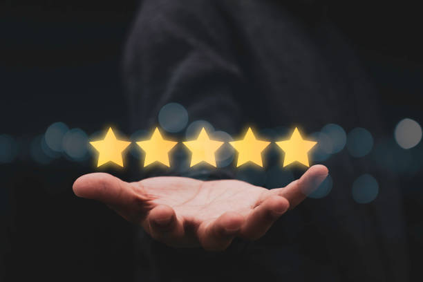 istock Businessman showing five star on hand for customer evaluation result. Customer satisfaction for product and service concept. 1283864396