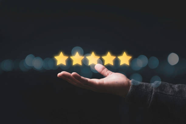 istock Businessman showing five star on hand for customer evaluation result. Customer satisfaction for product and service concept. 1283864468