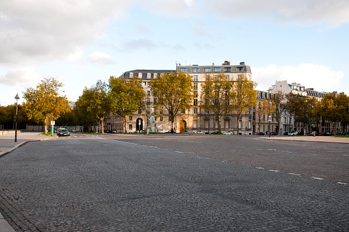 Empty street during second wave and second coronavirus lockdown in Paris, place Vauban, at the foot of Les Invalides and avenue de Breteuil.  Paris in France. November 3, 2020