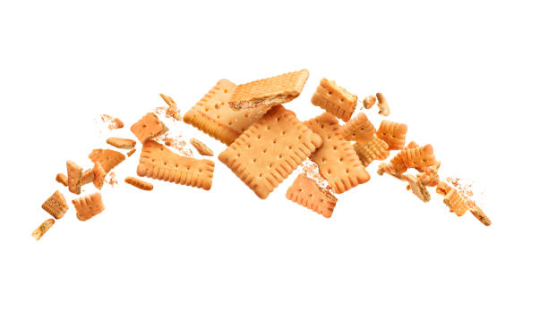 istock Beautifully broken cookies into pieces with falling crumbs on a white background 1283868426