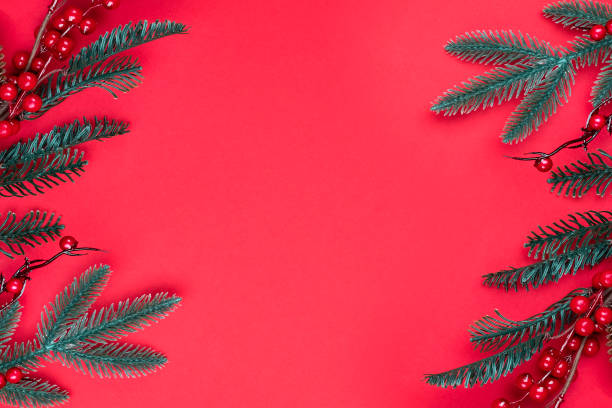 istock Christmas decorations on the red background with copy space for your text. 1283869575