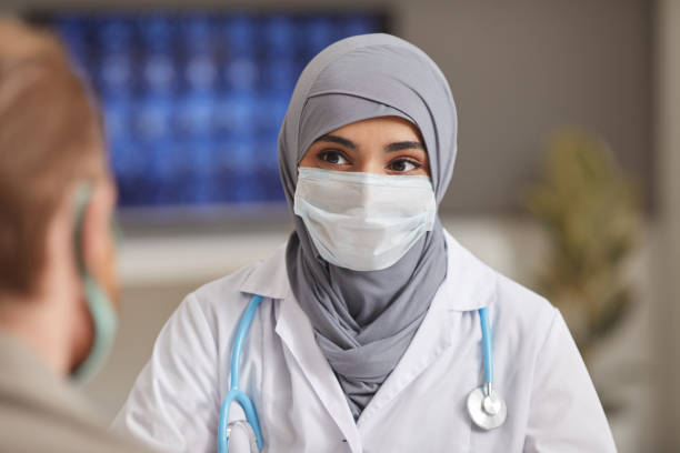 istock Muslim doctor in mask 1283873078