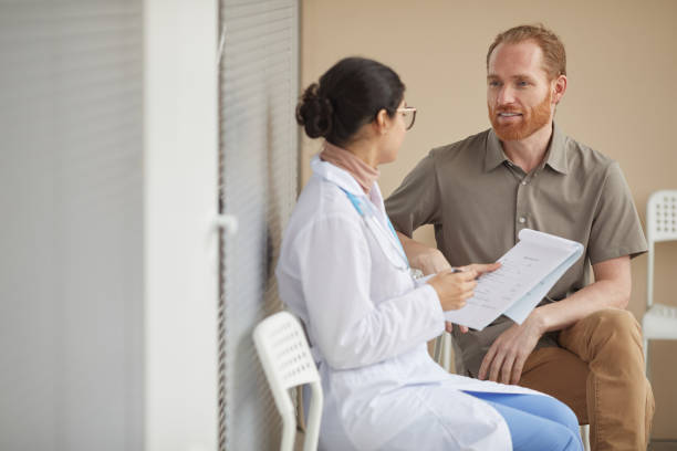 istock Patient talking to nurse 1283873656