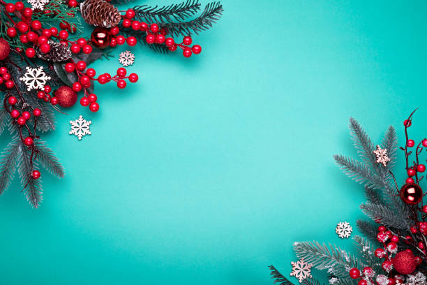 istock Decorated Christmas tree on the blue background. Top view with copy space for your text. 1283874040