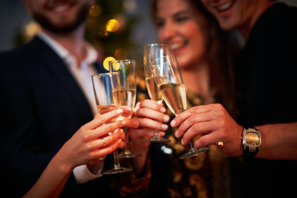 istock Two beautiful young couples having fun at New Year's Eve Party 1283875632