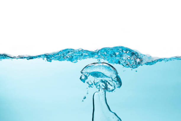 istock Air bubble and water splash,Water splash isolated on blue and white  background. 1283877468