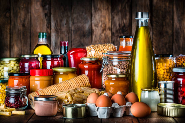 istock Non-perishable food on rustic wooden table. Copy space 1283879001