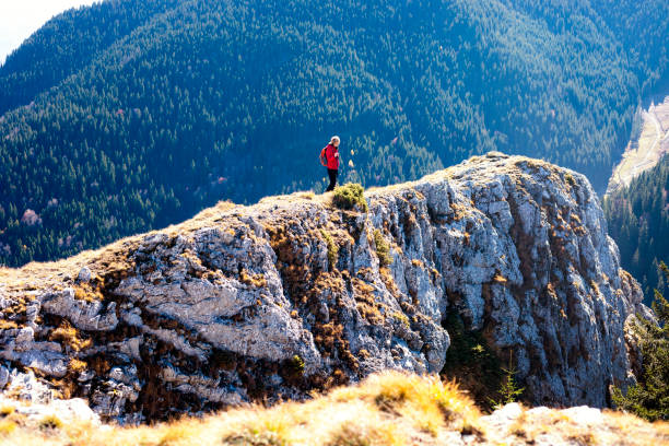 istock Woman traveler in a mountains 1283879070