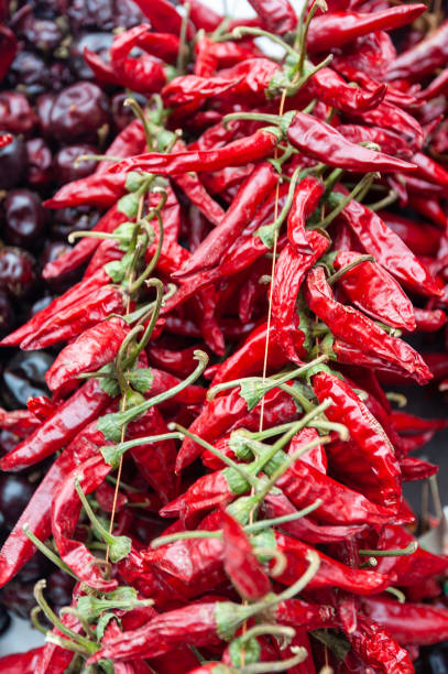 istock Dried red chili paprika hang in bunch. 1283880688