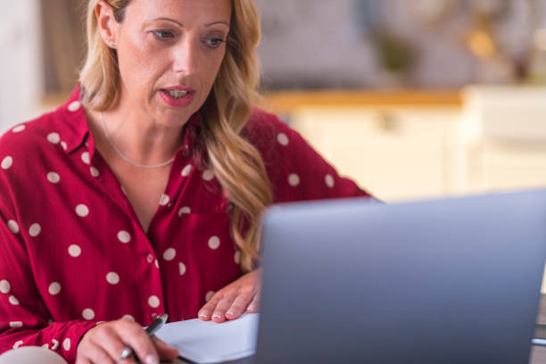 istock Mature woman working from home 1283880739