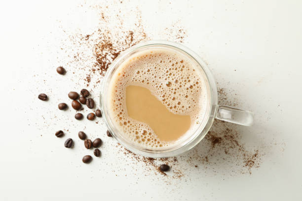 istock Cup of coffee and coffee beans on white background 1283882430