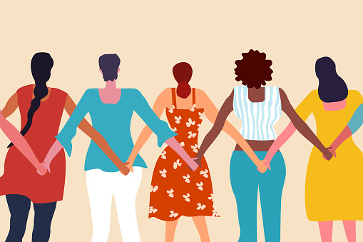 Multi ethnic women facing back with their hands holding together. A Women's day concept