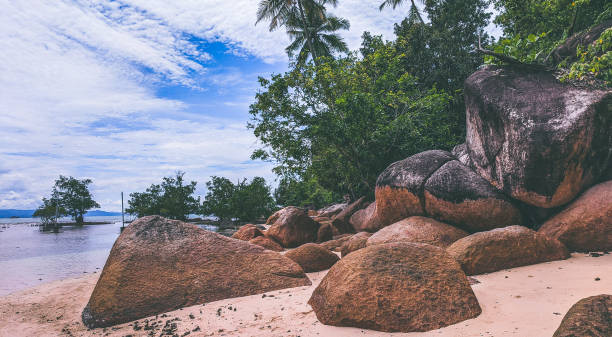 istock Big Rocks And Beautiful Sky at The Beach 1283883569